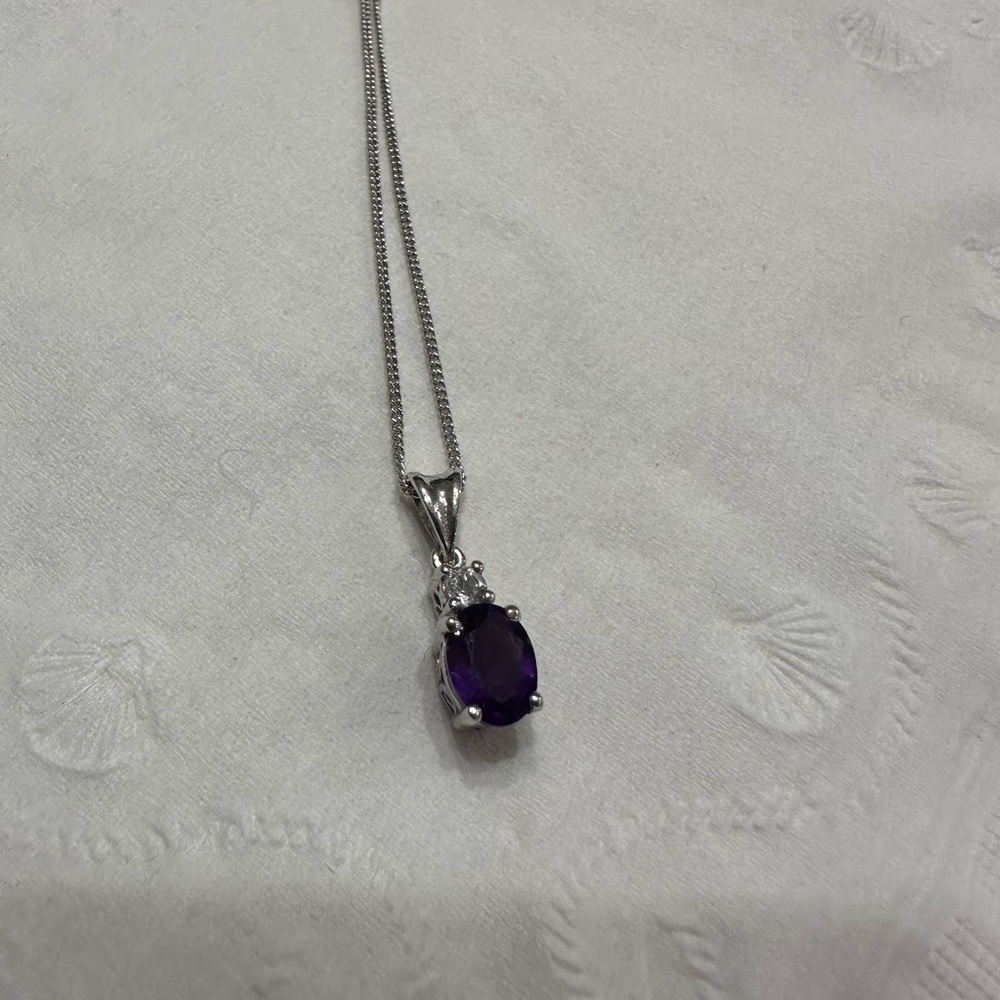 Beautiful necklace with purple stone